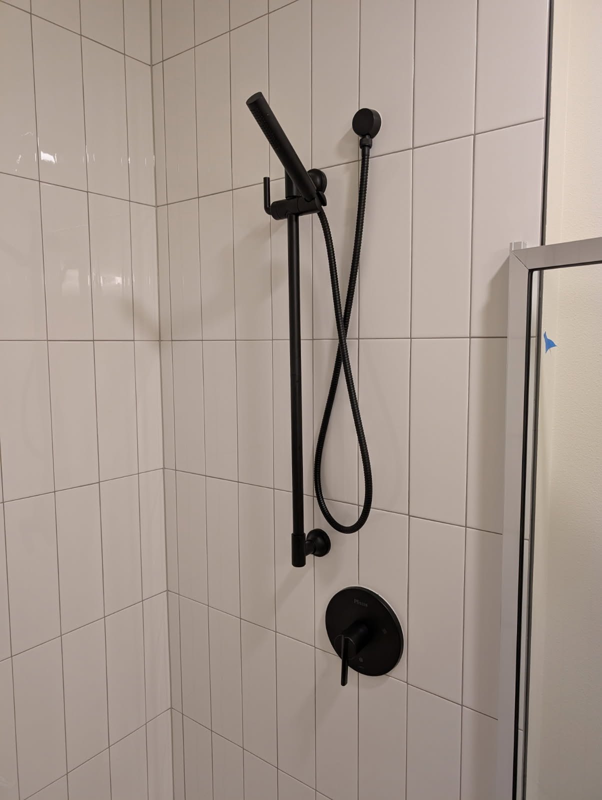 Matte black shower valve and hand-held slide bar installed on Camano Island